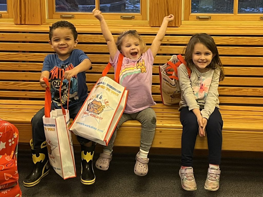 Kids enjoying our Holiday Build- a- Pal program.