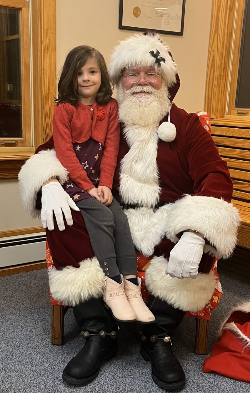 Olivia Mosher with Santa Chris