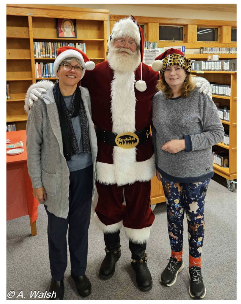 Santa Christ with two members of our "Friends of the Library"