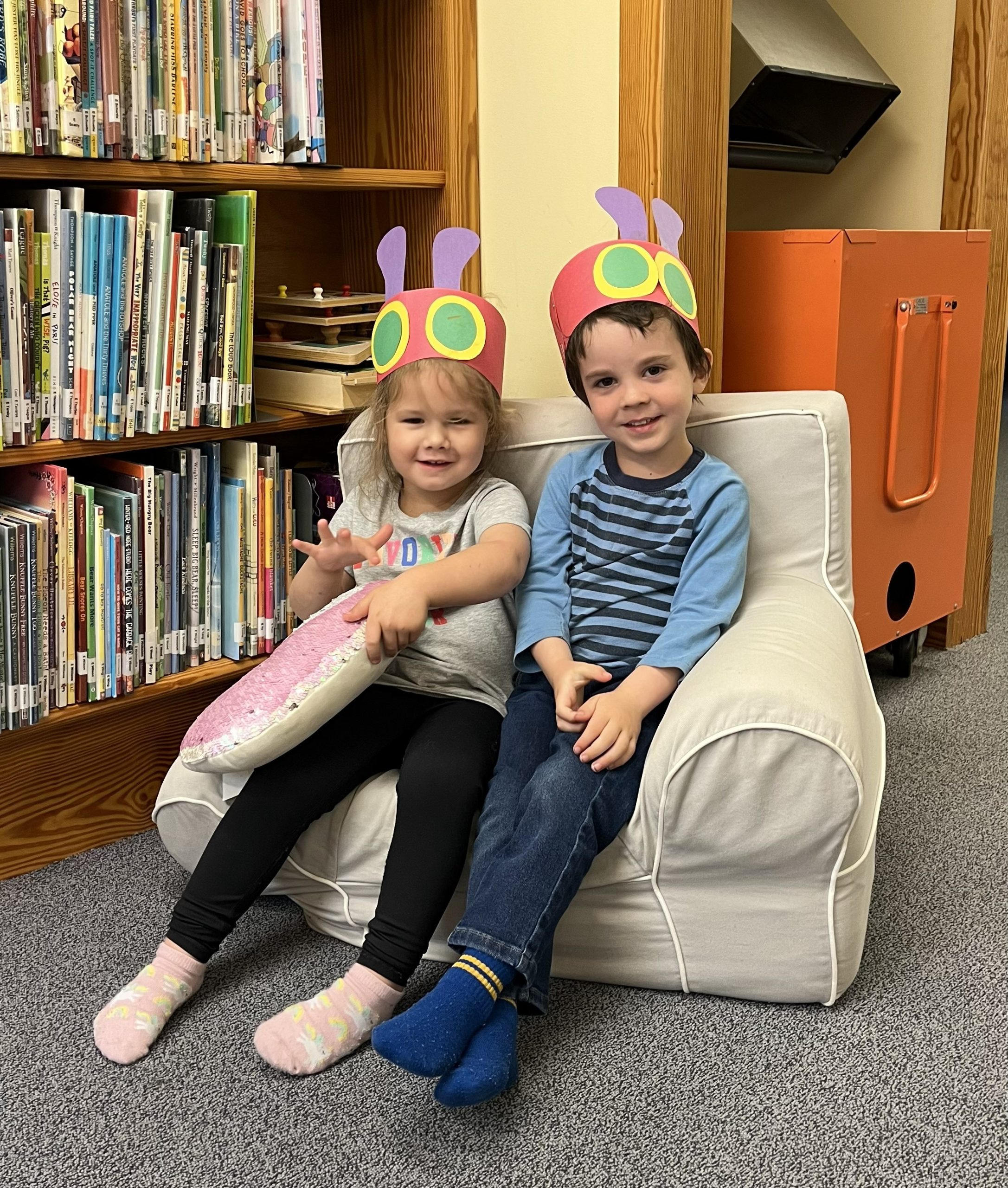 Frankie and Wyatt wearing their very hungry caterpillar hats